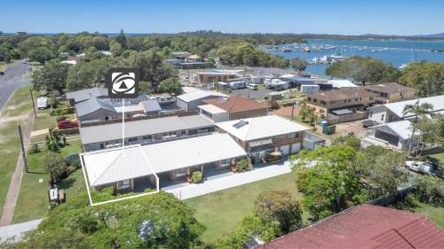 an aerial view of a house in a suburb at Akuli By The Sea Unit 4 in Iluka