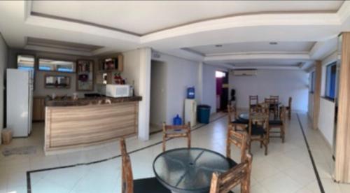 The lounge or bar area at M'S Azul Pousada