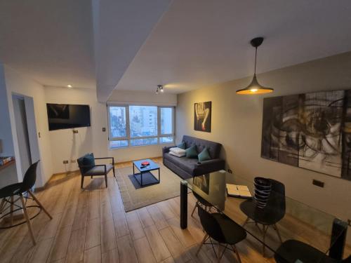 TV a/nebo společenská místnost v ubytování Acogedor 2BR Miraflores - Tovar