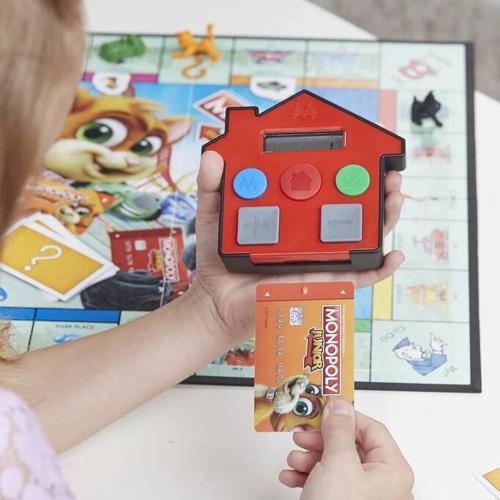 a child holding a toy house on a package at Kiddie Hostel Unit30A-kids and pets friendly in Subic bay freeport zone in Kababae