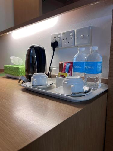 Una cocina o cocineta en Paragon Lutong Hotel