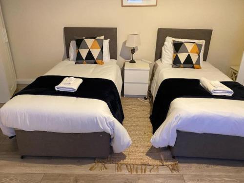 Кровать или кровати в номере Cosy Retreat Home Away from Home ''Garnet''