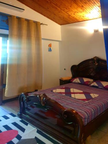 Ένα ή περισσότερα κρεβάτια σε δωμάτιο στο Casa Meryem chaouen