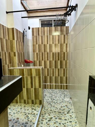 a bathroom with a shower and a sink at Los Almendros Beach in San Andrés