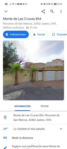 a page of a website with a picture of a house at Casa Huesped San Marcos in Ciudad Juárez