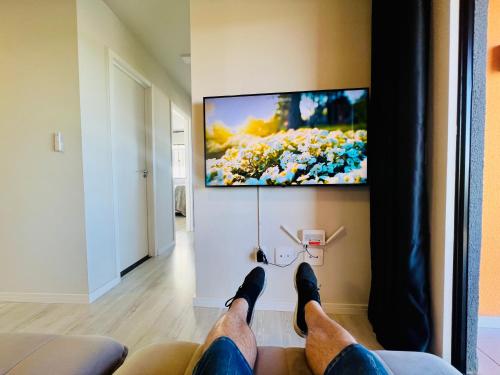 Televisyen dan/atau pusat hiburan di APT Moderno com muitos itens , 3 quartos e 2 vagas de garagem