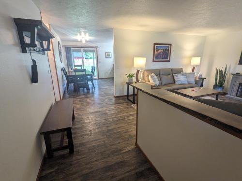 a living room with a couch and a table at Cozy Place for Family and Friends in Dundee