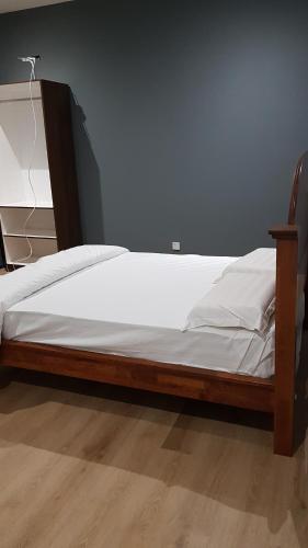 Postel nebo postele na pokoji v ubytování Homestay KNK