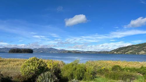a large body of water with mountains in the background at Tota Pulchra in Tota