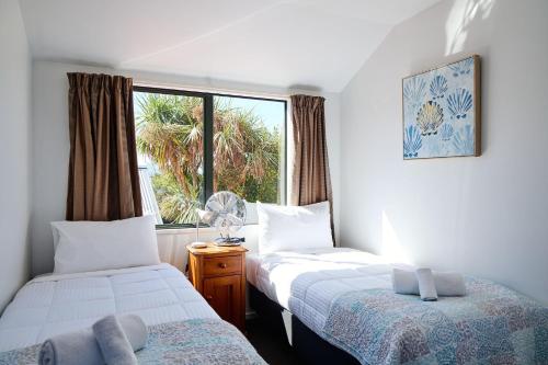 Ένα ή περισσότερα κρεβάτια σε δωμάτιο στο Revive House