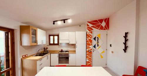 Kuchyň nebo kuchyňský kout v ubytování Casa Vacanze Azzurra