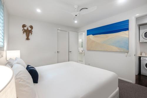 Katil atau katil-katil dalam bilik di Pavillions on Hamilton Island by HIHA