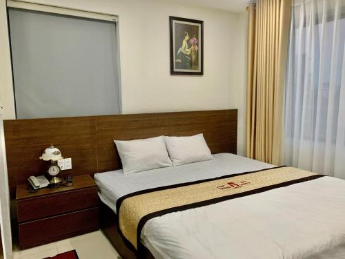 Krevet ili kreveti u jedinici u objektu Thăng Long 2 Hotel FLC