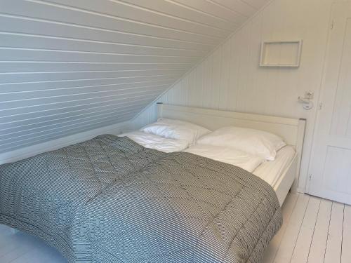 Postel nebo postele na pokoji v ubytování Ferienhaus am Hafen Zingst