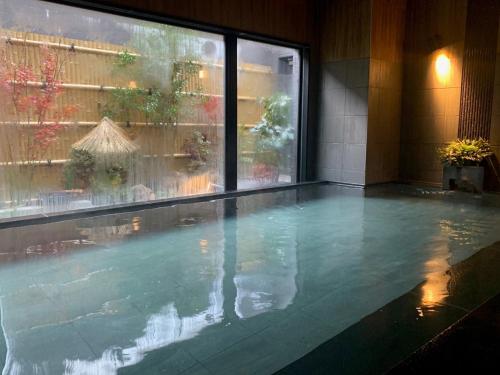 Πισίνα στο ή κοντά στο Hotel Route Inn Fukushima Nishi Inter