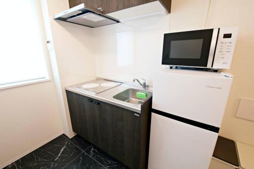 Køkken eller tekøkken på リリハウス笹塚