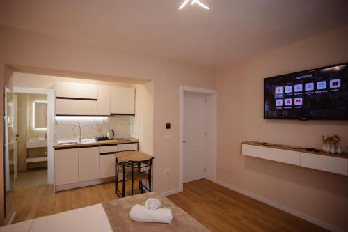 Kuchyň nebo kuchyňský kout v ubytování City Center Studio Apartments