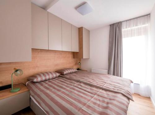 En eller flere senger på et rom på Apartment Martinus-R