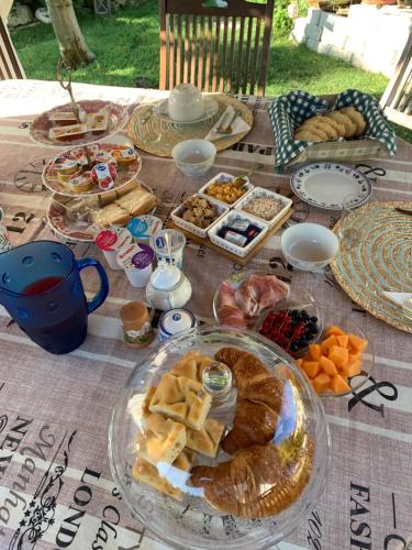 a table with a bunch of different types of food at La Casa di Biba in Massa Lombarda