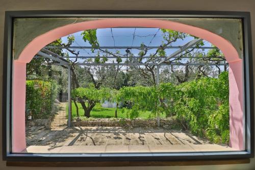 Jardín al aire libre en Masseria Trullo Sovrano Exclusive B&B