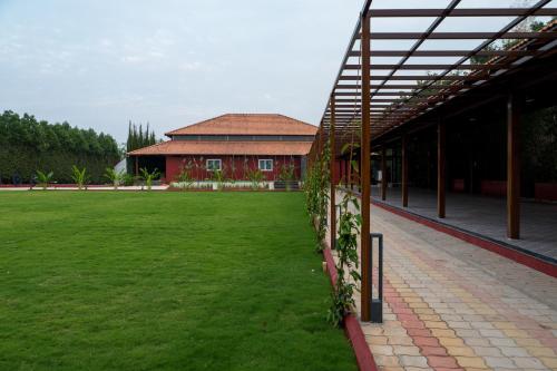 Κήπος έξω από το Poojaris Nirantara - Mysuru
