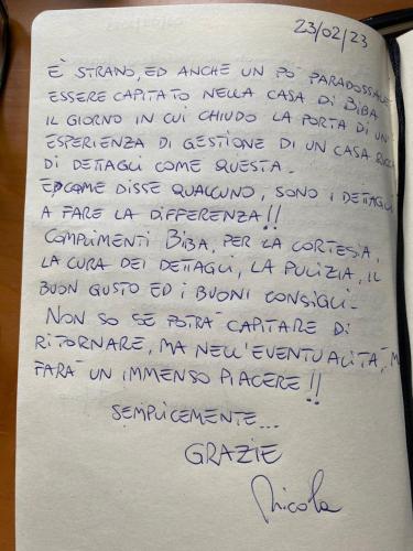 a letter with handwriting on a sheet of paper at La Casa di Biba in Massa Lombarda