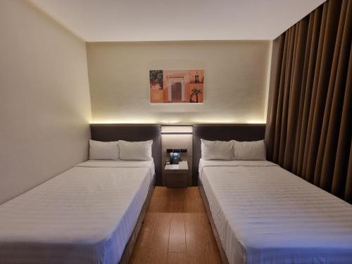 Postel nebo postele na pokoji v ubytování Altori Park Hotel
