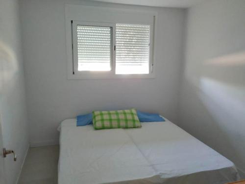 A bed or beds in a room at Clauhomes Nido del Golf