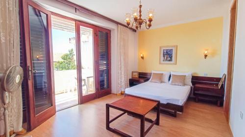 Postel nebo postele na pokoji v ubytování Family villa on the coast