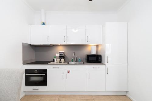 Una cocina o zona de cocina en Little Paradise