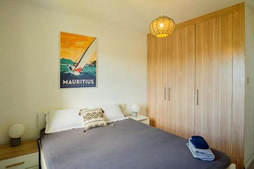 Postel nebo postele na pokoji v ubytování Palm Biche Residence