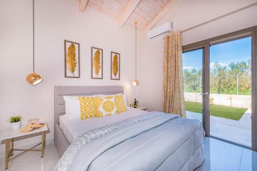 Postel nebo postele na pokoji v ubytování Villa Levanta by Villa Plus