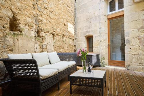 Ruang duduk di Les Appartements de la Cadène