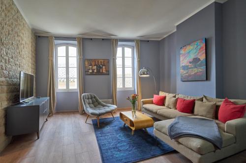 Ruang duduk di Les Appartements de la Cadène