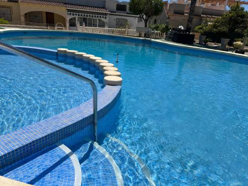 Holiday home with large roof terrace near La Mata beach