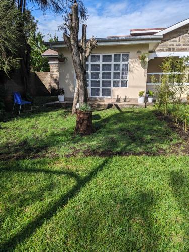 a tree in the yard of a house at Kiamboni in Nakuru