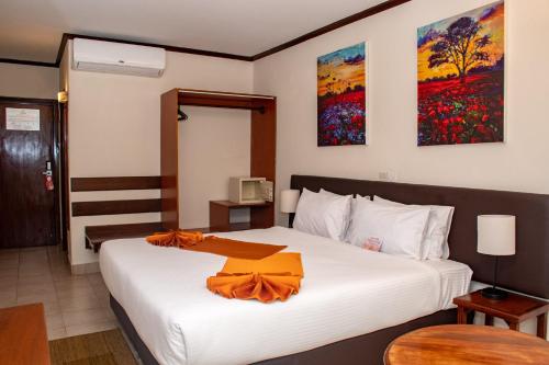 Postel nebo postele na pokoji v ubytování Hotel Boulevard Nairobi, City Centre CBD