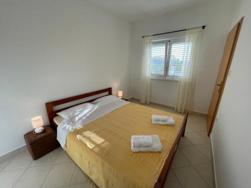 Llit o llits en una habitació de Seaview apartments