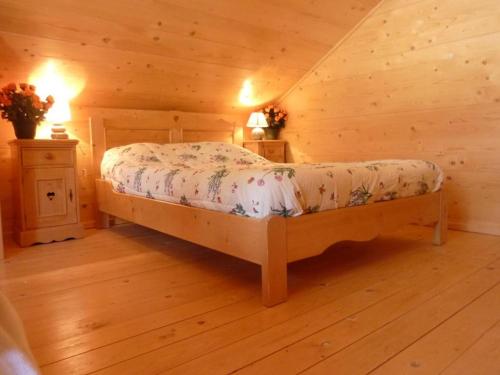 Ένα ή περισσότερα κρεβάτια σε δωμάτιο στο Chalet Garrigue aux Orres