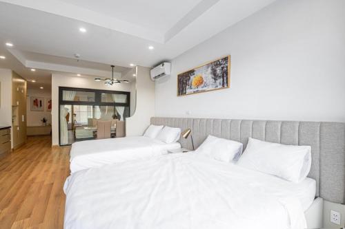 Postel nebo postele na pokoji v ubytování TMS Luxury Residence Quy Nhơn