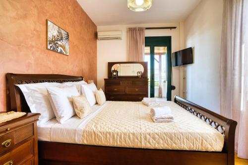 Posteľ alebo postele v izbe v ubytovaní Mariliza's Spacious Maisonette