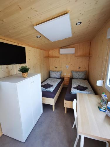 Postel nebo postele na pokoji v ubytování Tiny Guesthouse Herdt Euerbach