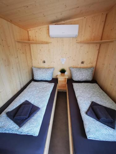 Postel nebo postele na pokoji v ubytování Tiny Guesthouse Herdt Euerbach