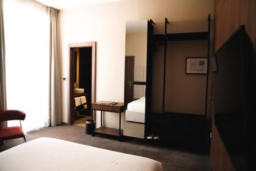 Postel nebo postele na pokoji v ubytování DeGrassi Boutique Garni Hotel Izola