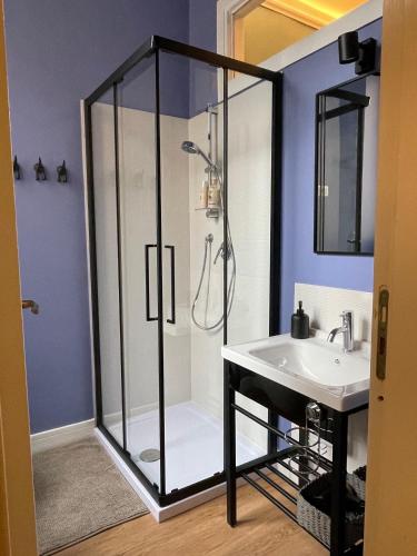 a bathroom with a shower and a sink at Casa Flos31 in Catania