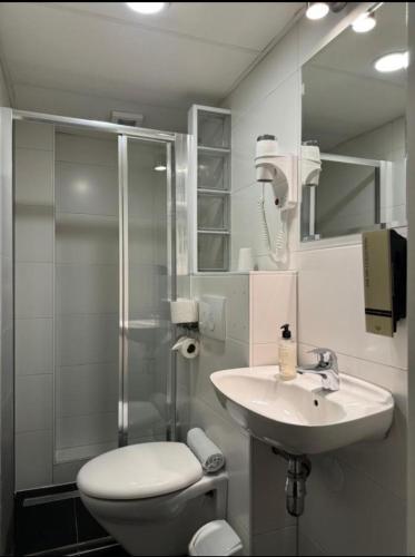 Koupelna v ubytování Hotel Titus City Centre