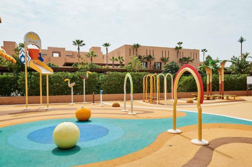 a childrens playground with a water park at Park Hyatt Marrakech in Marrakech