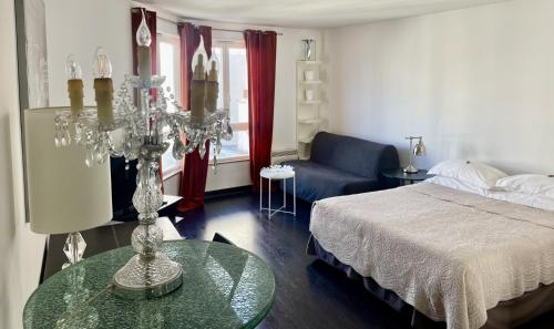 Ένα ή περισσότερα κρεβάτια σε δωμάτιο στο Neuilly Park Hotel