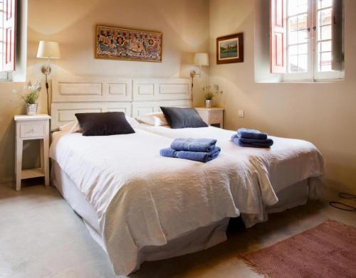 Кровать или кровати в номере Apartamento Azul