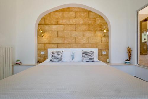 Postel nebo postele na pokoji v ubytování Terrazza Levante - Boutique rooms